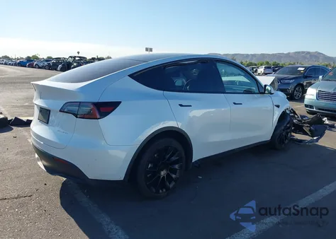 2022 Tesla Model Y Long Range Dual Motor All-Wheel Drive из США, поврежденный, VIN 7SAYGDEE8NA017647